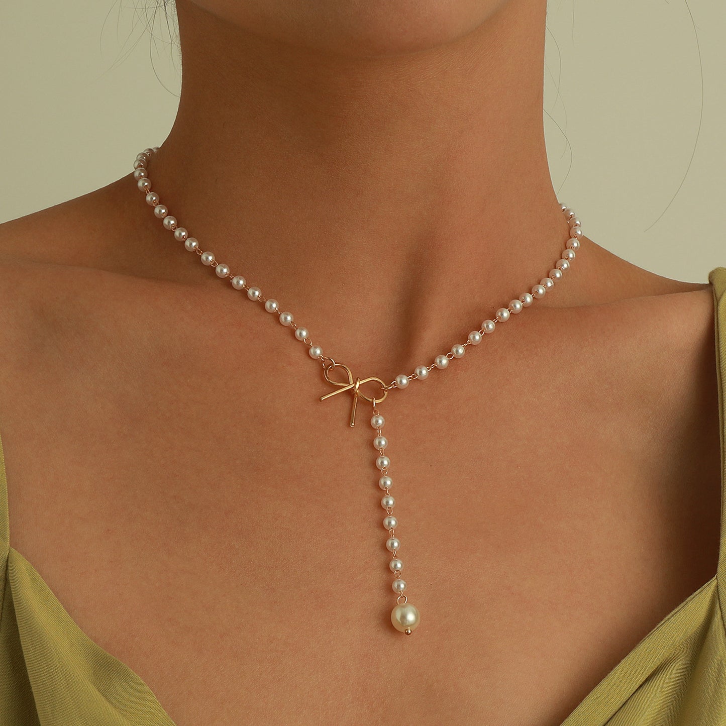 Collier femme nœud perles pampilles – style simple et élégant