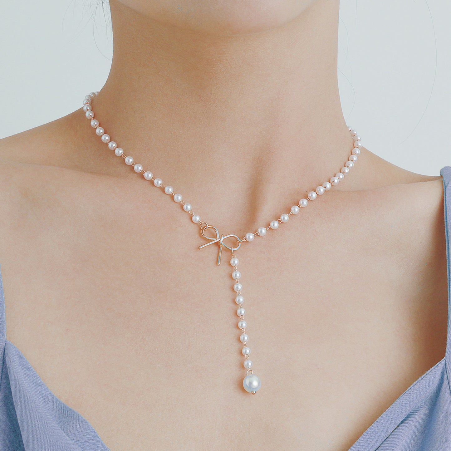 Collier femme nœud perles pampilles – style simple et élégant