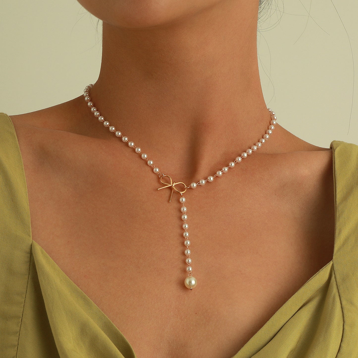 Collier femme nœud perles pampilles – style simple et élégant
